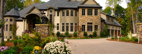 House with paved driveway